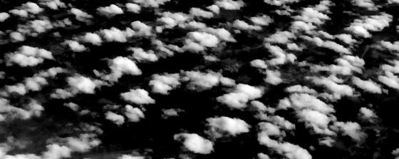Cloud patterns from above. B&W aerial photography by Alina Oswald. All Rights Reserved.