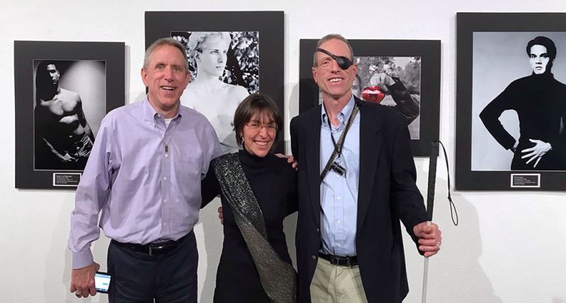 With Terry Roberts and award-winning photographer Kurt Weston attending the opening night of Weston's show, Remember: An AIDS Retrospective, at OCCCA.
